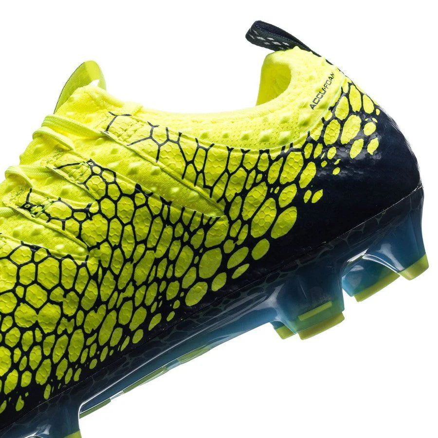 PUMA Evopower Vigor 1 Graphic FG Firm Ground Soccer Cleats Safety Yellow Silver