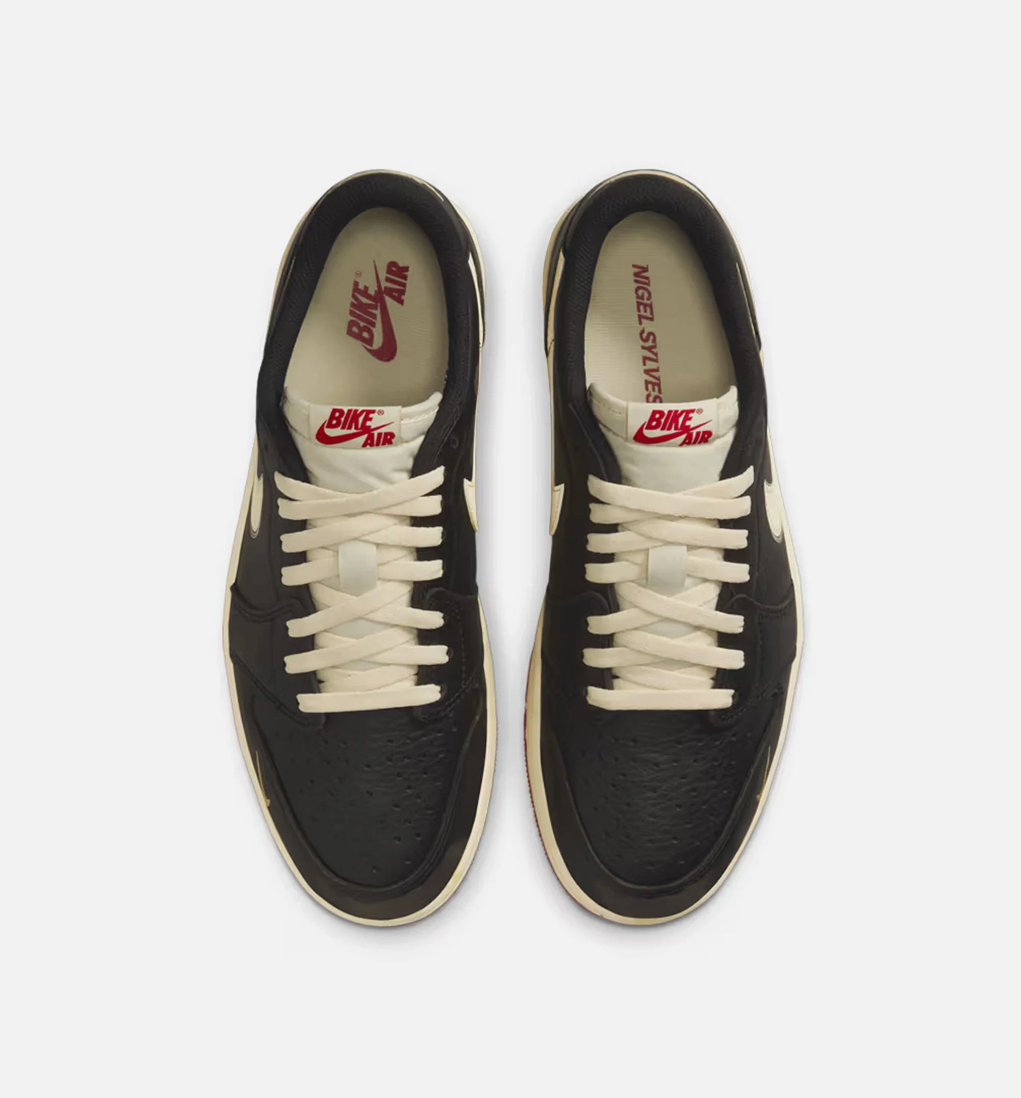 Nigel Sylvester x Air Jordan 1 Retro Low Nitro Mens Lifestyle Shoe Black Muslin Varsity Red Limit One Per Customer